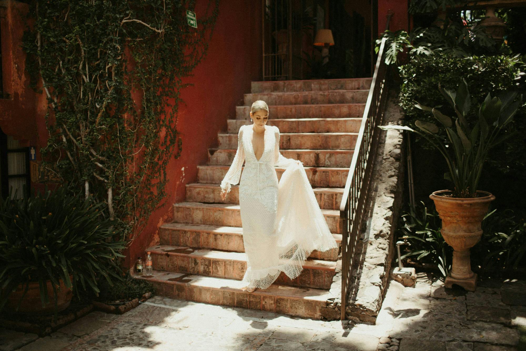 bride walking down stairs in san miguel de allende
