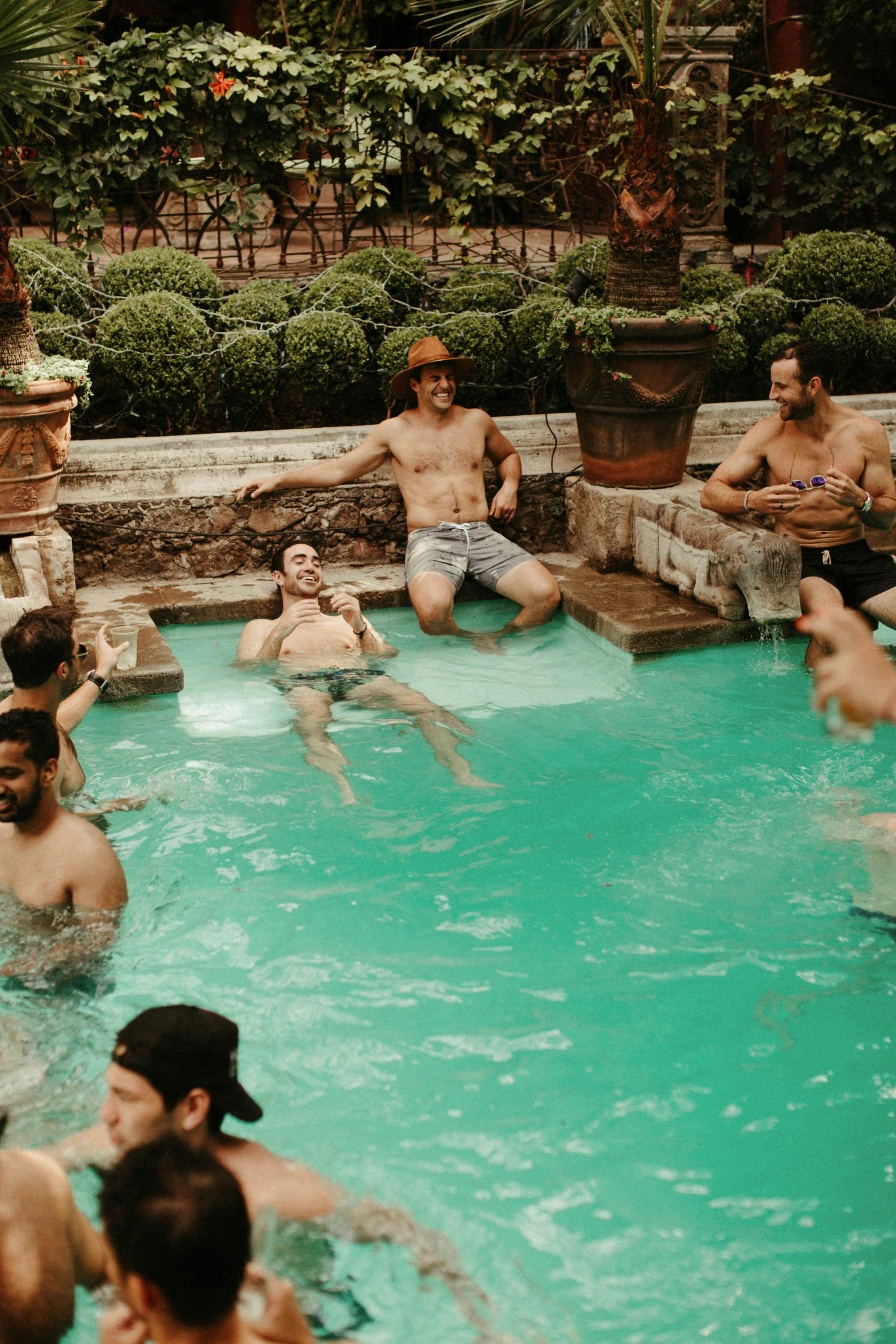 friends relaxing and chilling poolside