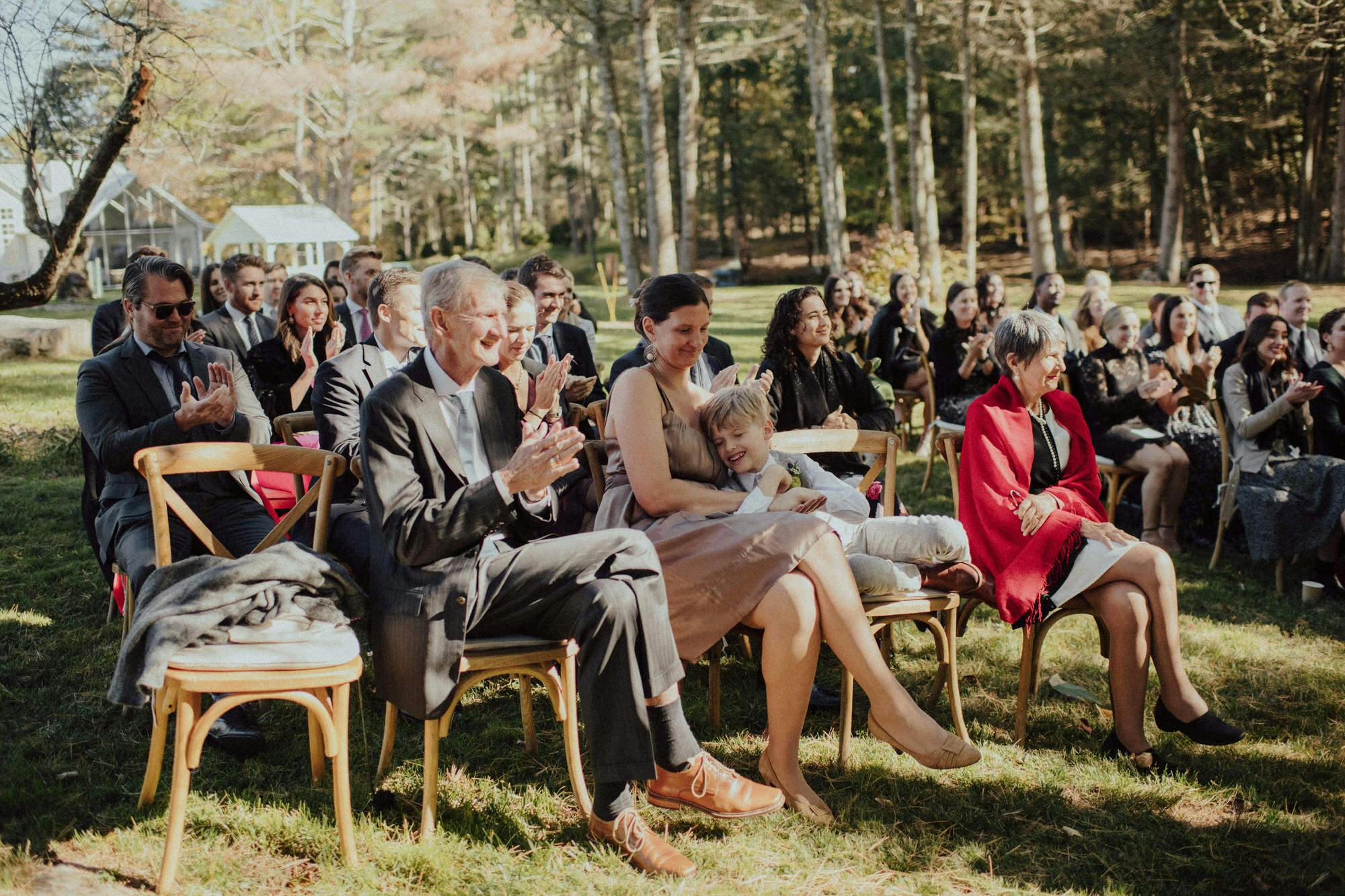 candid shots of guests at ceremony
