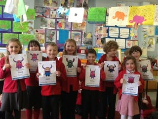 winning children get their Teach Your Monster to Read certificates