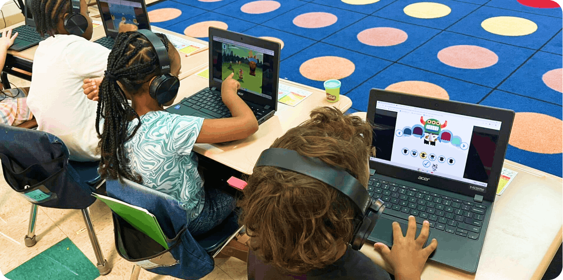 School kids using our game on laptops