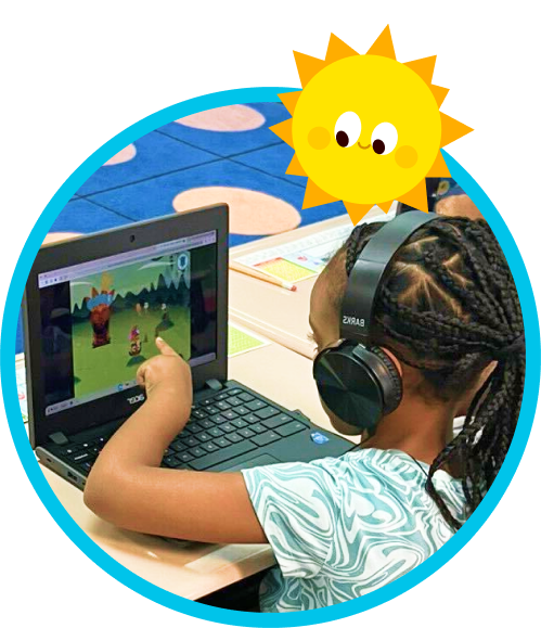 A child playing Teach Your Monster to Read on a laptop