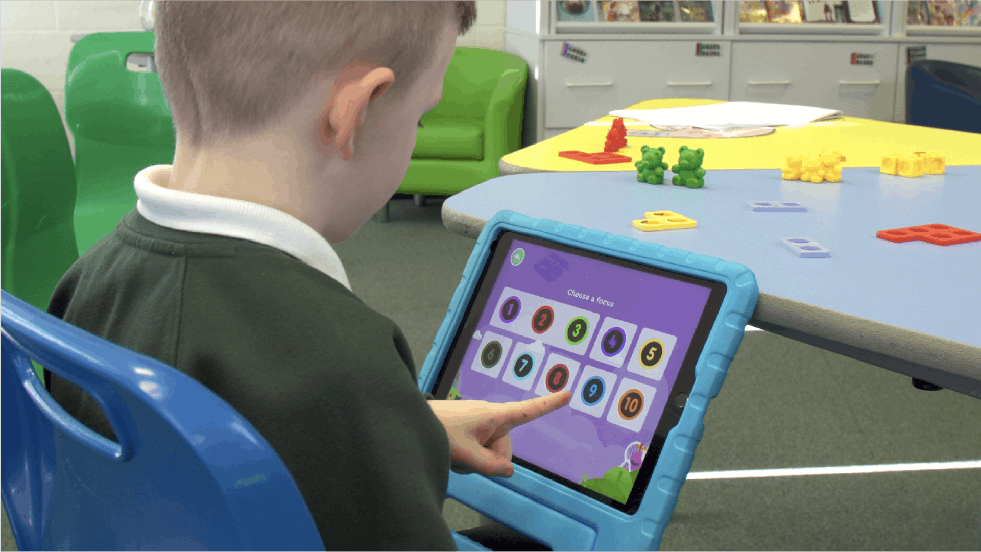 A child playing Number Skills independently
