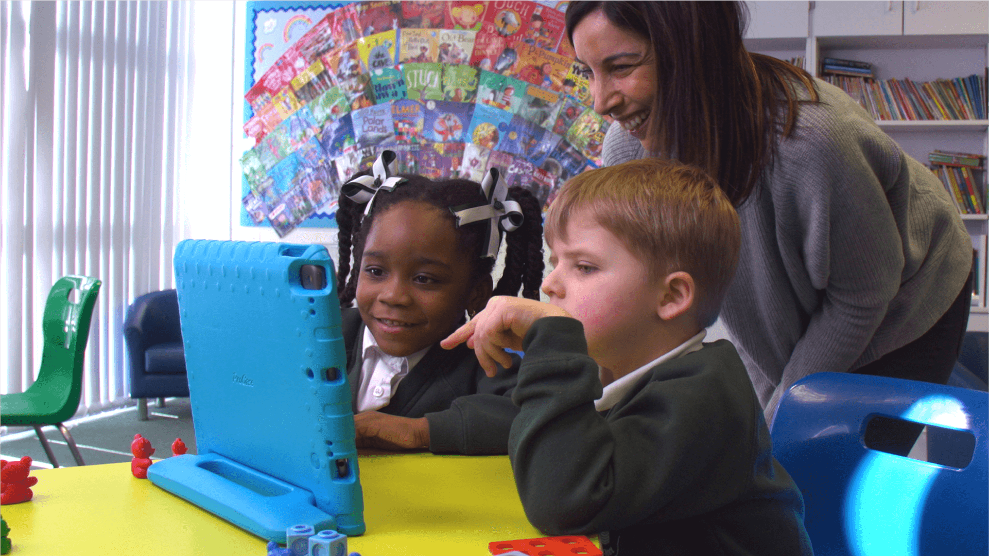 Carla playtesting with two school children