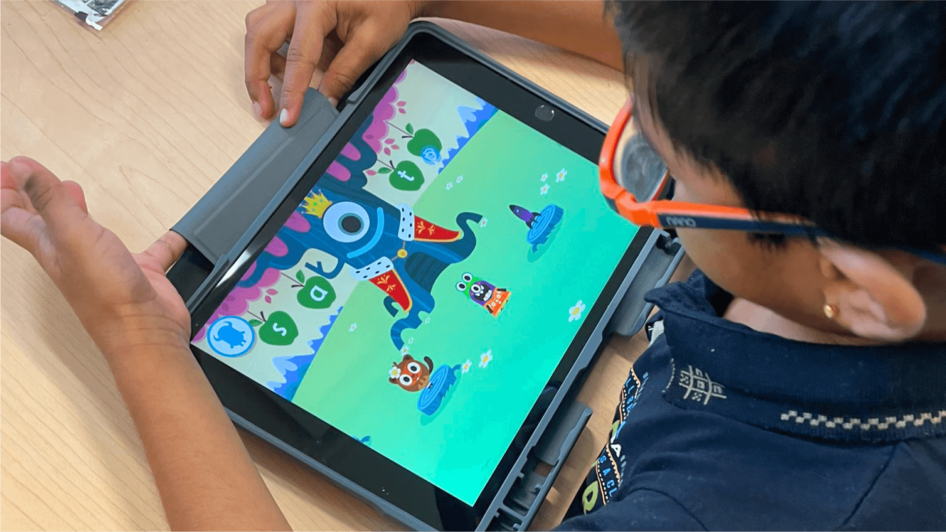 A child playing our phonics game