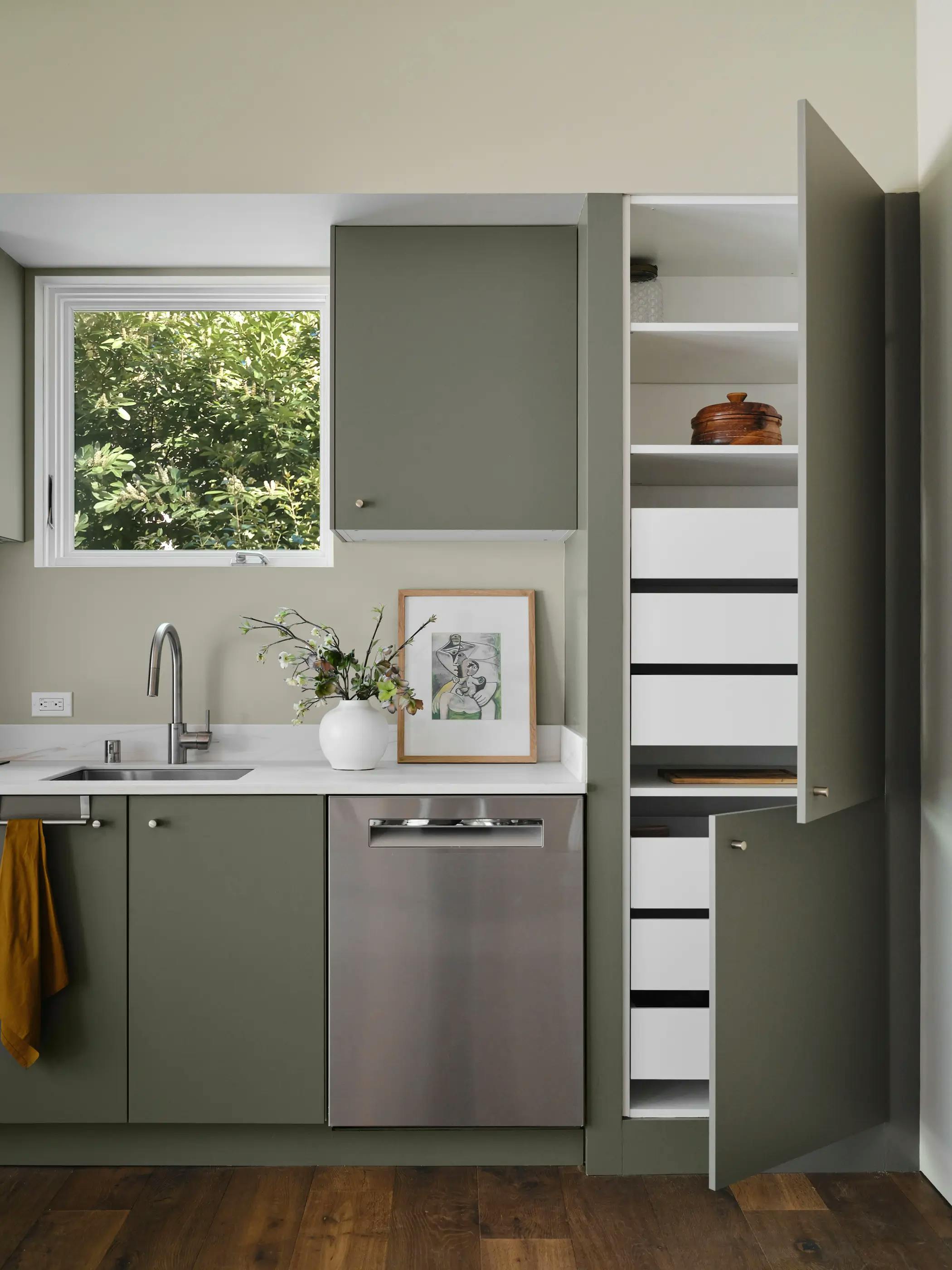 Interior shot showing kitchen cabinet storage in a Type Five ADU