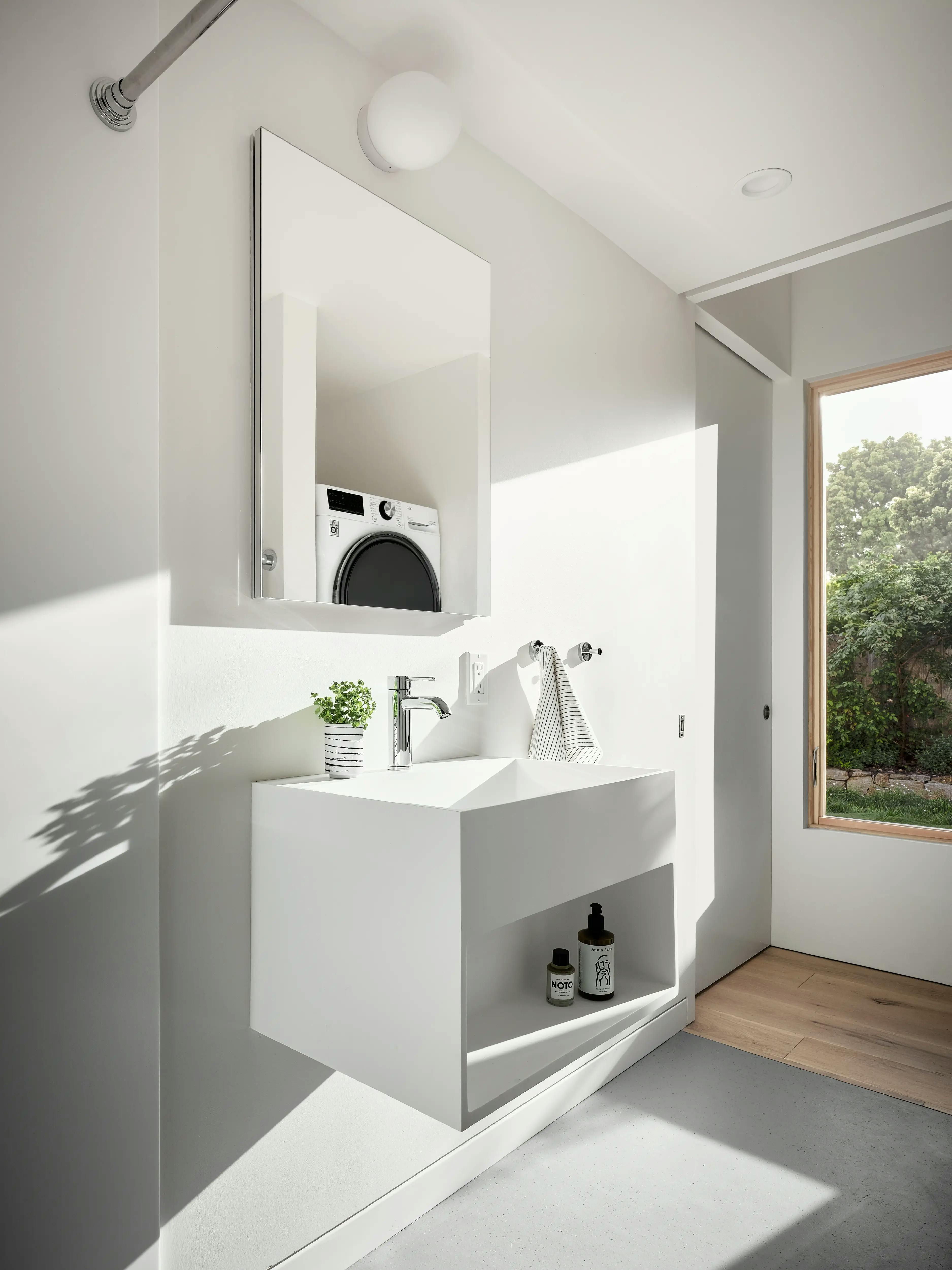 View of a Type Five ADU bathroom with laundry