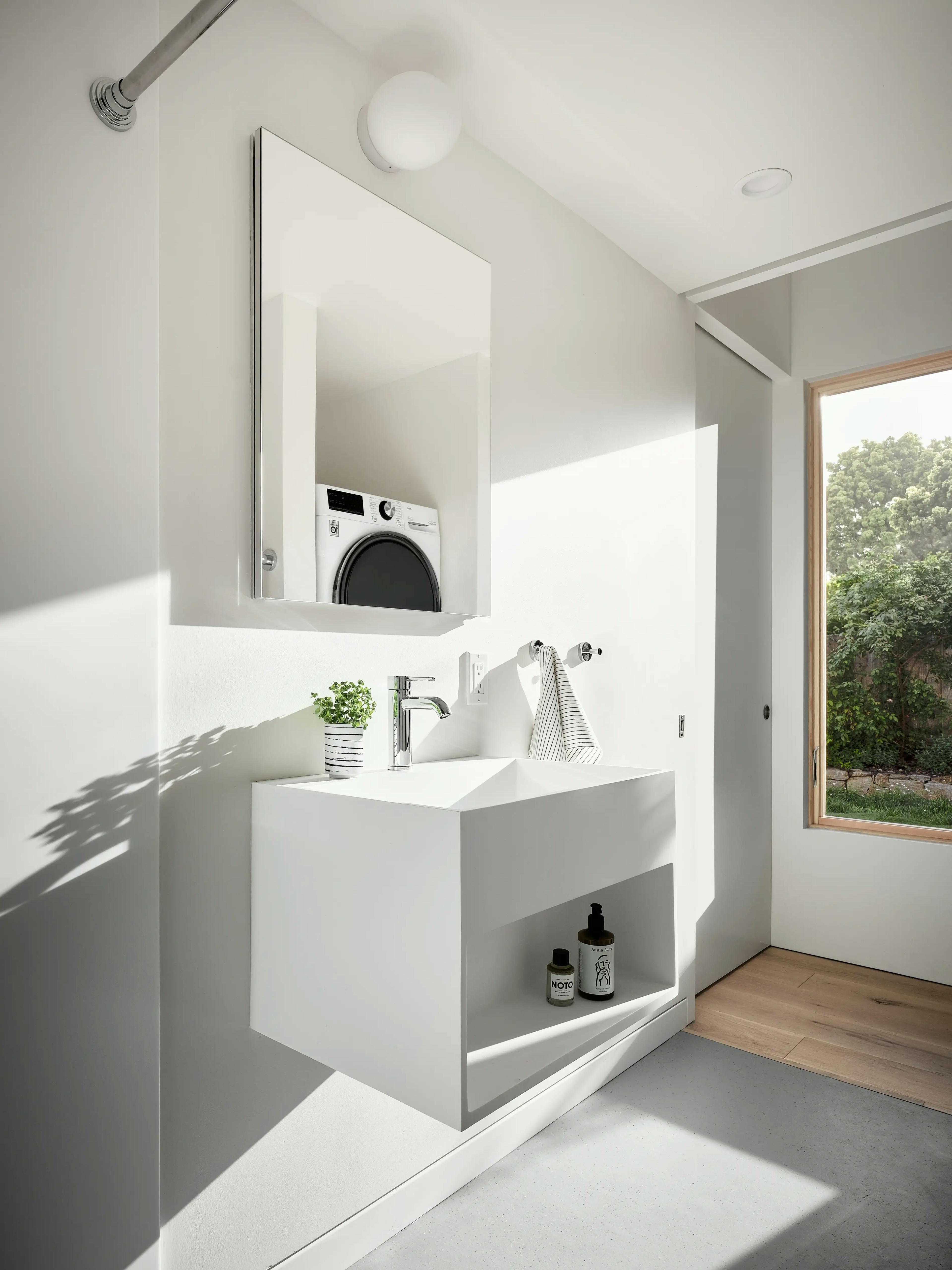 View of a Type Five ADU bathroom with laundry