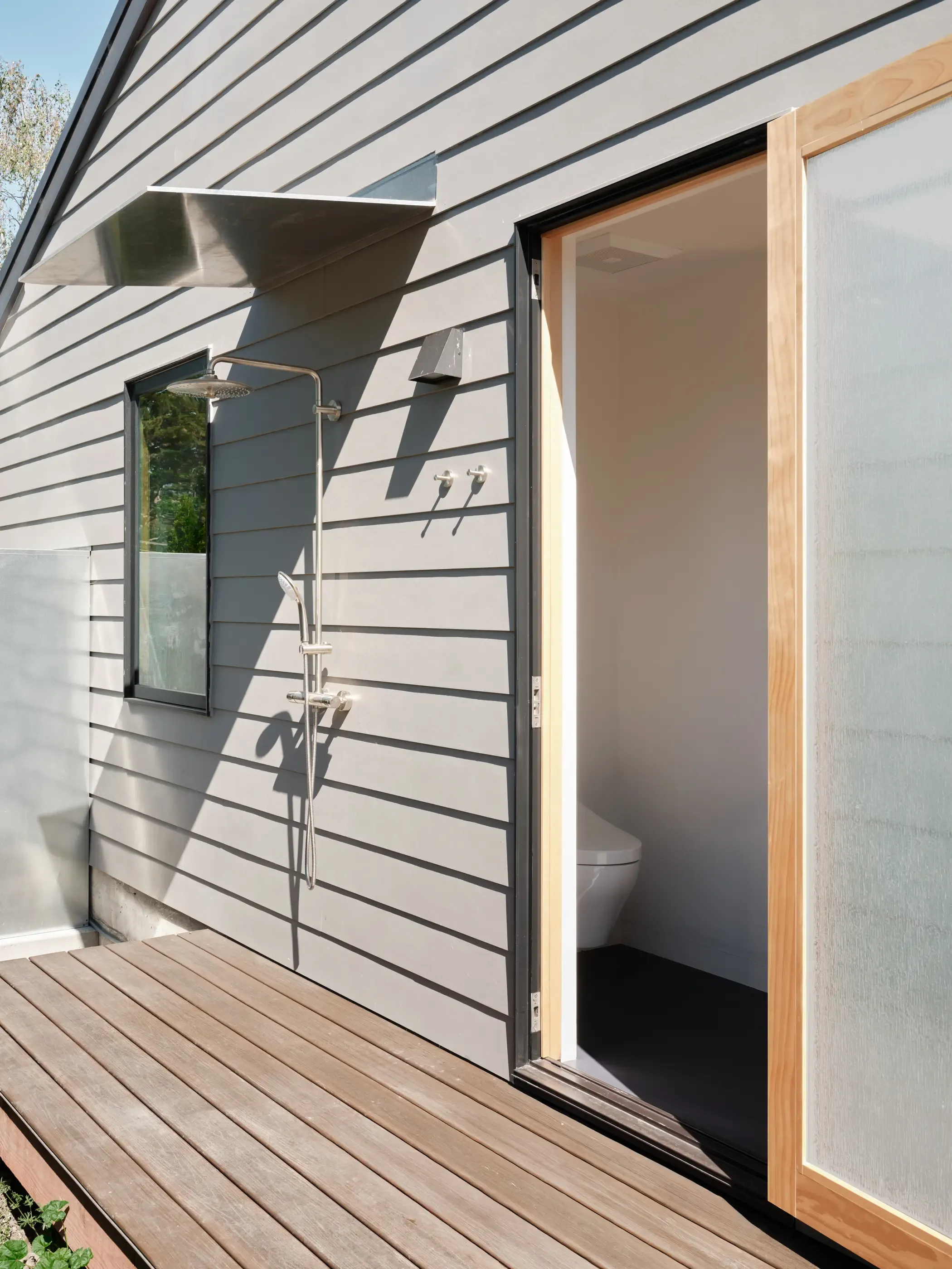 Exterior shot of an outdoor shower on a Type Five ADU