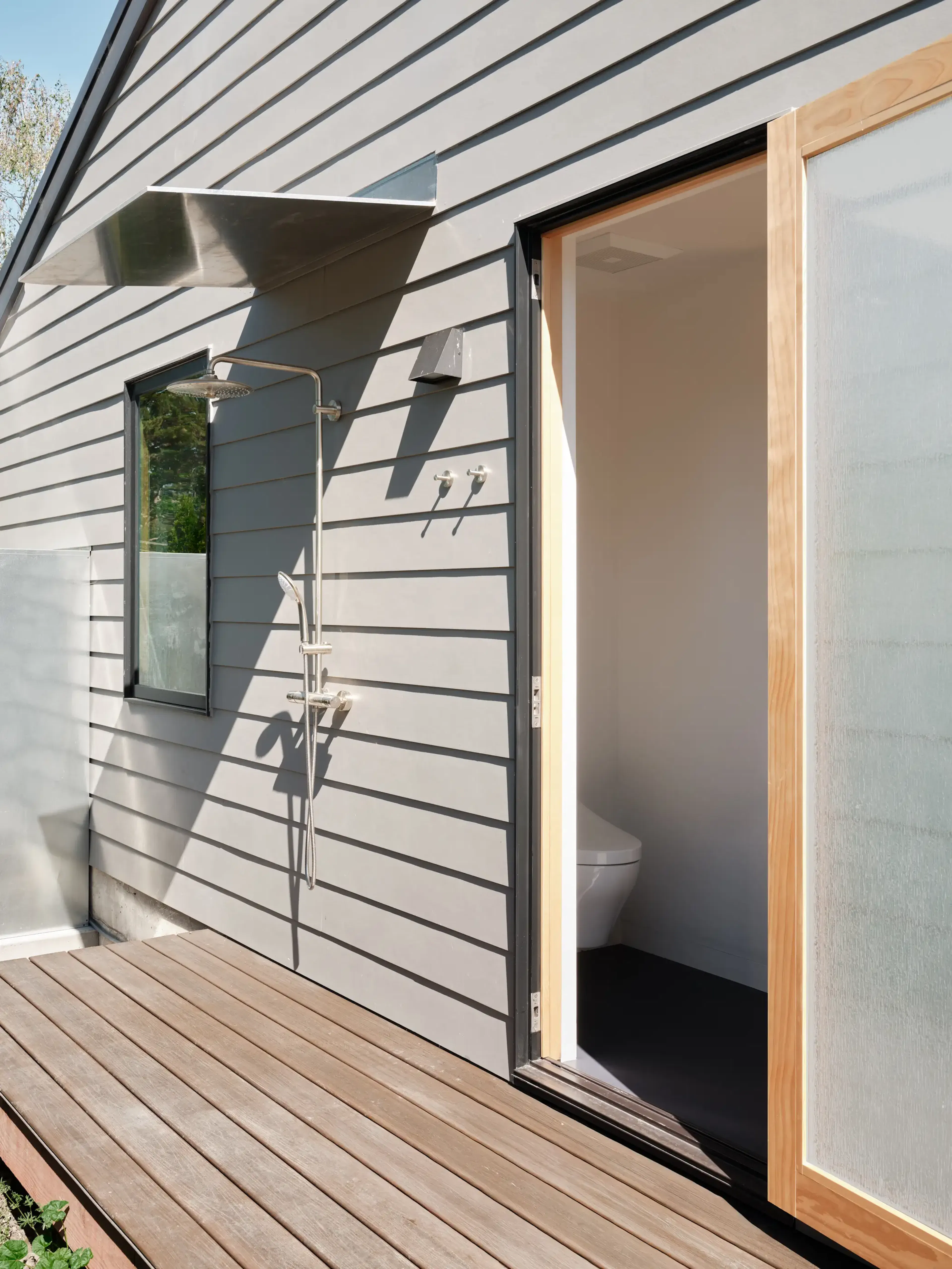 Exterior shot of an outdoor shower on a Type Five ADU