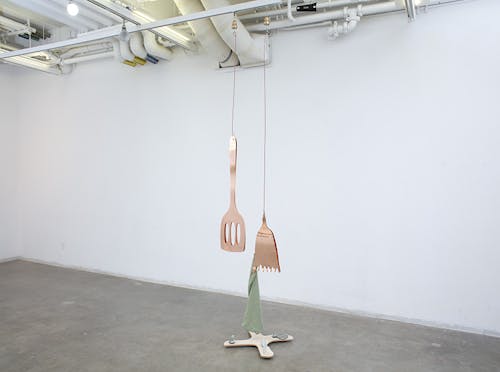Padres Trabajadores Copper, wood, Textile Linen, motor, and ceramic.