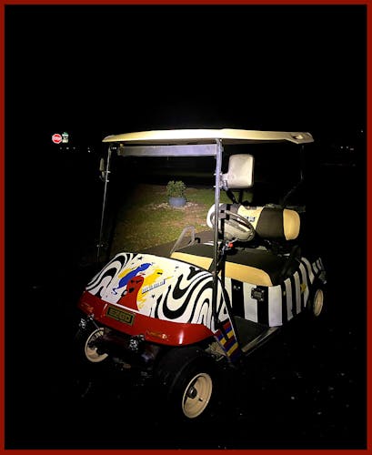 An illustration of 3 musical ghosts and high-contrast patterns spray painted onto a golf cart