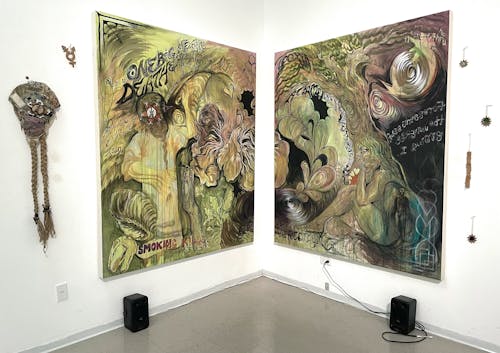 Installation consisting of two large-scale, acrylic paintings on stretched canvas, hung adjacent in the corner of a gallery space. Palm-sized ceramic charms and a hand-sewn, custom-designed hat made from canvas and recycled camouflage fabric are hung alongside the paintings. A figure wearing the hat, referencing a prior performance piece wearing the hat, is depicting in the left painting, mirrored by a figure emerging from the center of an arched tree in the right painting. Text and gestural brushstrokes create the effect of fluidity and form connections between the two paintings. A large set of lungs is represented in the center of the painting, alongside hidden messages and spiritual musings, as well as a cow skeleton, among other symbols. 