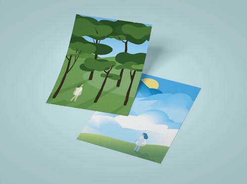 A mockup of two prints in the "Colorless" illustration series. One depicts a forest scene, the other depicts a cloud scene.  