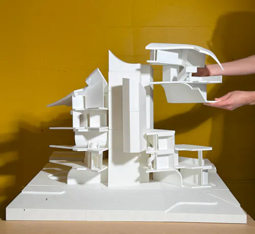 Exploded Axon: Modular Typologies — Physical model reveals stacked, reconfigurable modules designed for adaptive housing in rural coastal contexts.