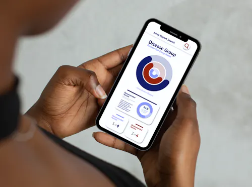 A person holding a phone with the screen displayed to reveal an app for Bioblot customers that showcases their medical information.