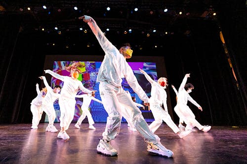 Twelve dancers wearing all black then switch to all white costumes dancing to several songs that exude the struggles and beauty of accepting themselves as part of the LGBTQIA+. The piece covers songs by Billie Ellish, Chloe and Halle, Lady Gaga, and a self made score.