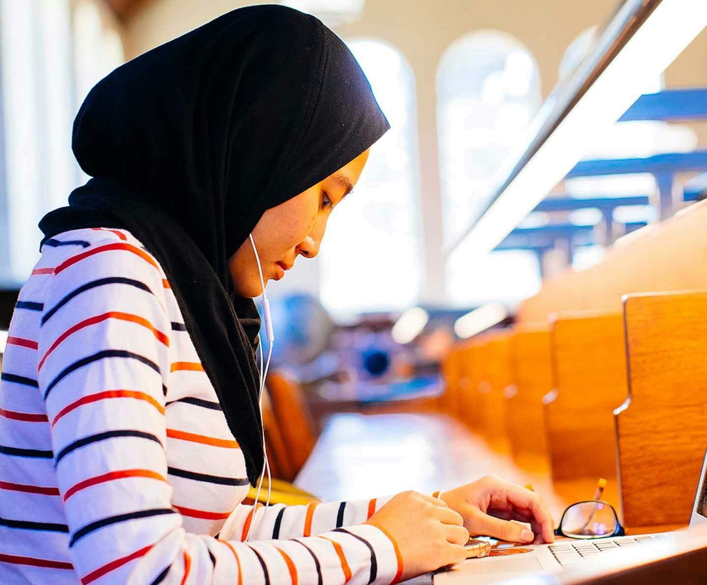 UCLA student studying at the library