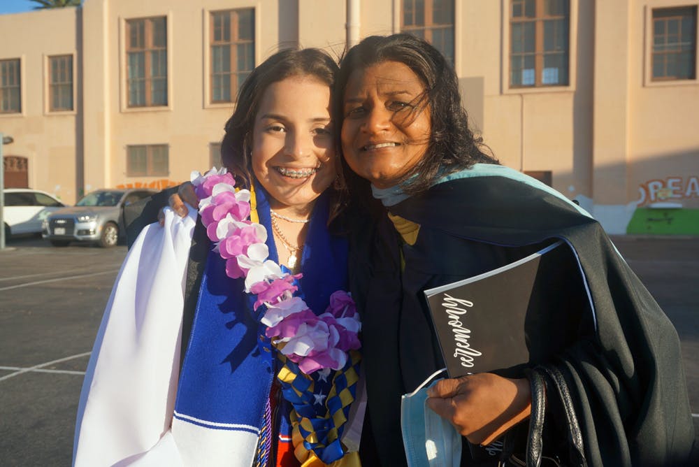Ashley Oliva Funes, valedictorian for the Mann UCLA Class of 2021, with Sunanda Kushon, calculus, physics, and statistics teacher. Funes will attend UC Riverside in the fall.