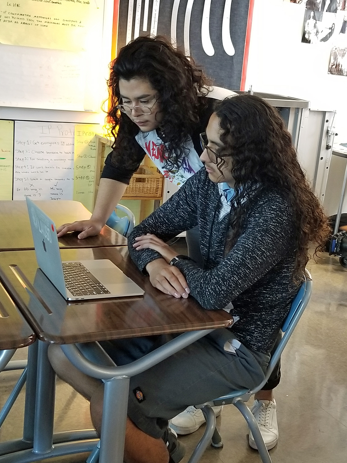LAUSD students looking at a laptop
