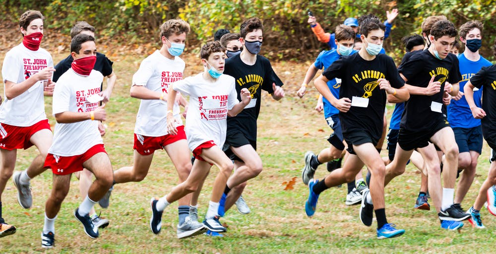 High school students running with face masks