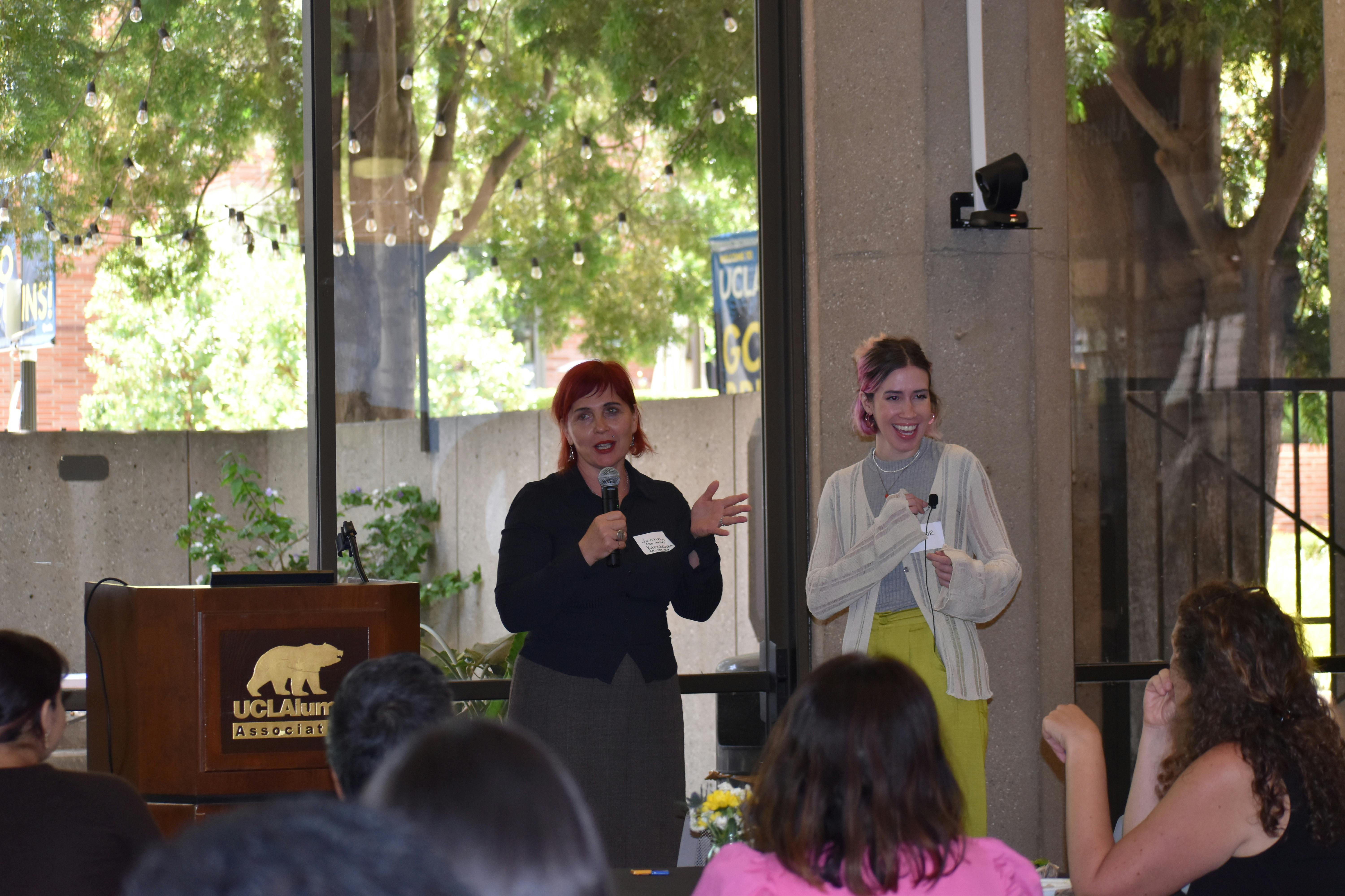 Dr. Joanna Karczewska, Associate Professor of Social Work at Cal State LA (left) and Eleanor Bray, MSW Candidate at Cal State LA (right). Dr. Karczewska introduces Bray before presenting her research project titled “He Told Me How to Spend My Money: Healthy Relationships and Financial Capability.”