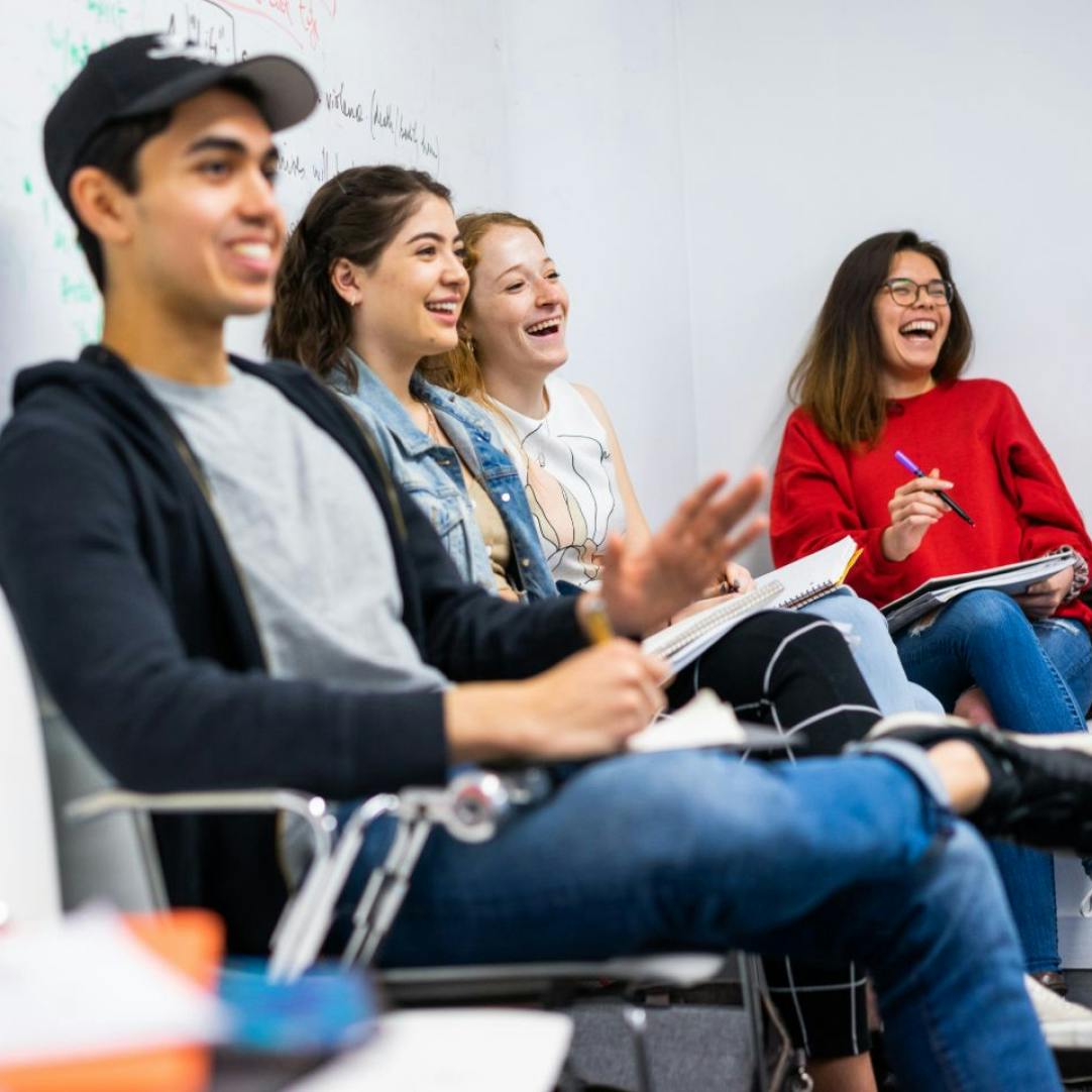 students laughing in classroom