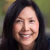 A picture of a smiling woman's face
