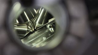 Analytical stage being used for surface science with up to 5-axes of motion and heating and cooling.