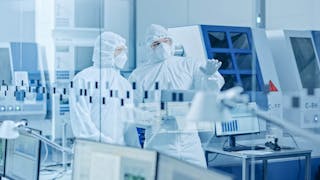 Engineers using UHV Design’s in-vacuum motion manipulation products for reproducible and reliable results.