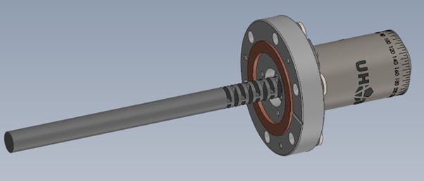 Flexure allowing a shaft to flex when force is applied