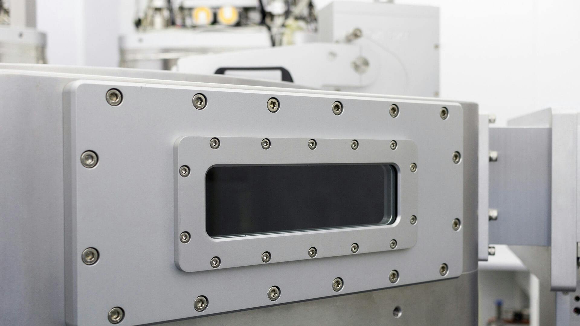 Thin-film deposition system using a UHV Design stage with heating and cooling as well as smooth sample transfer.