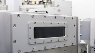 Thin-film deposition system using a UHV Design stage with heating and cooling as well as smooth sample transfer.