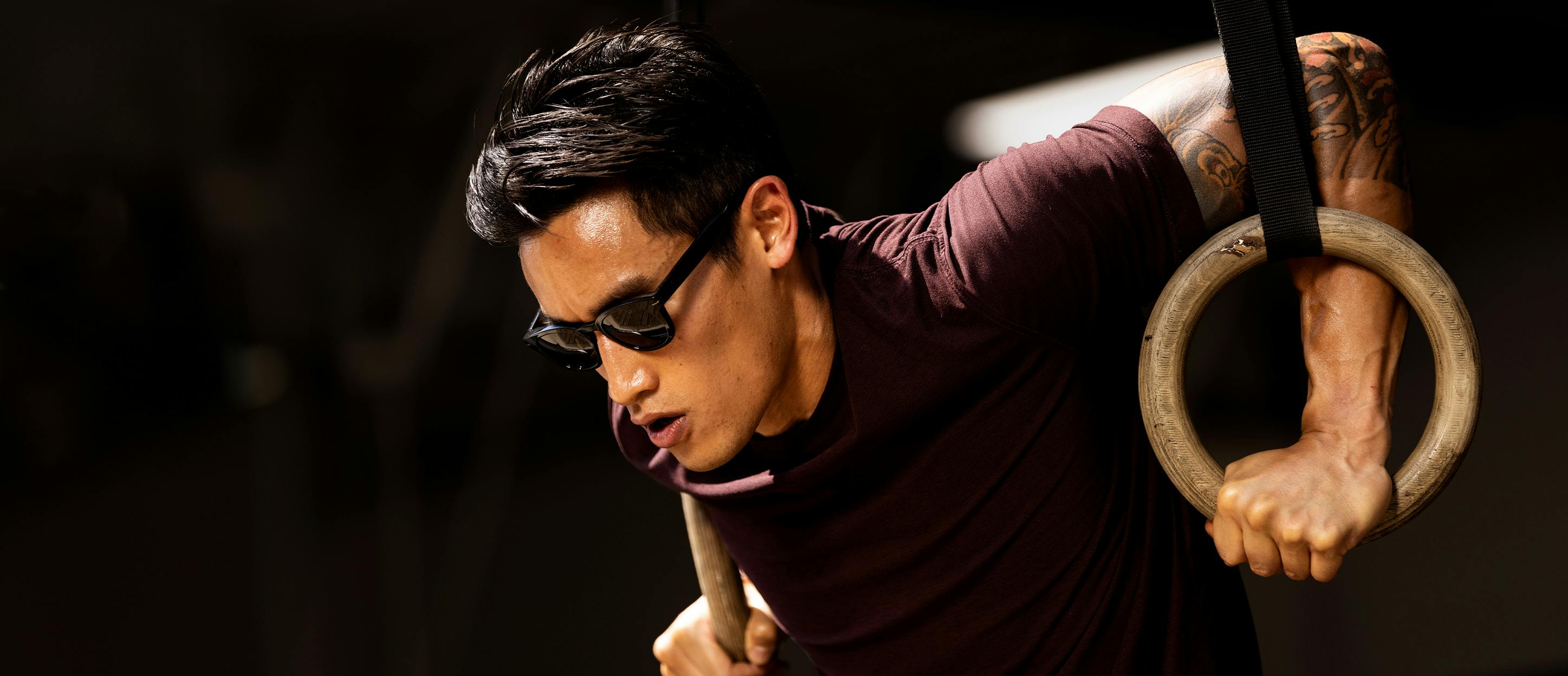 Man exercising wearing ROKA sunglasses