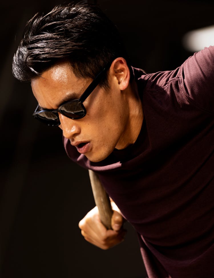 Man exercising wearing ROKA sunglasses