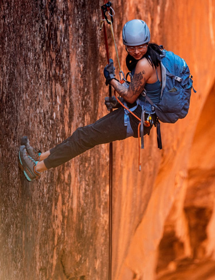 Woman climbing wearing ROKA eyeglasses