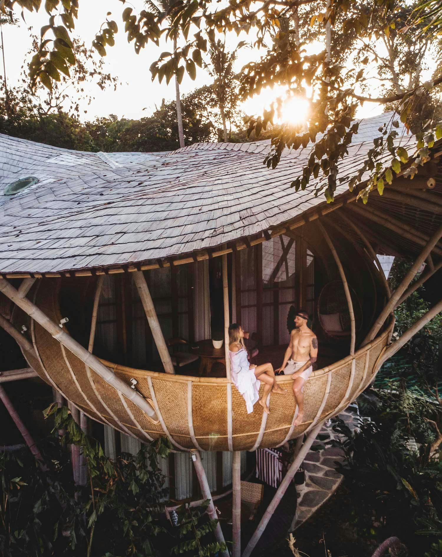 couple sitting on balcony of cocoon