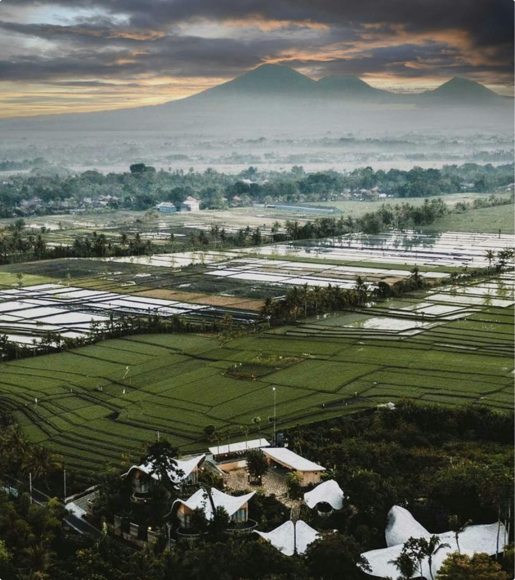 Drone shot of Ulaman from far with view of Mt. Agung