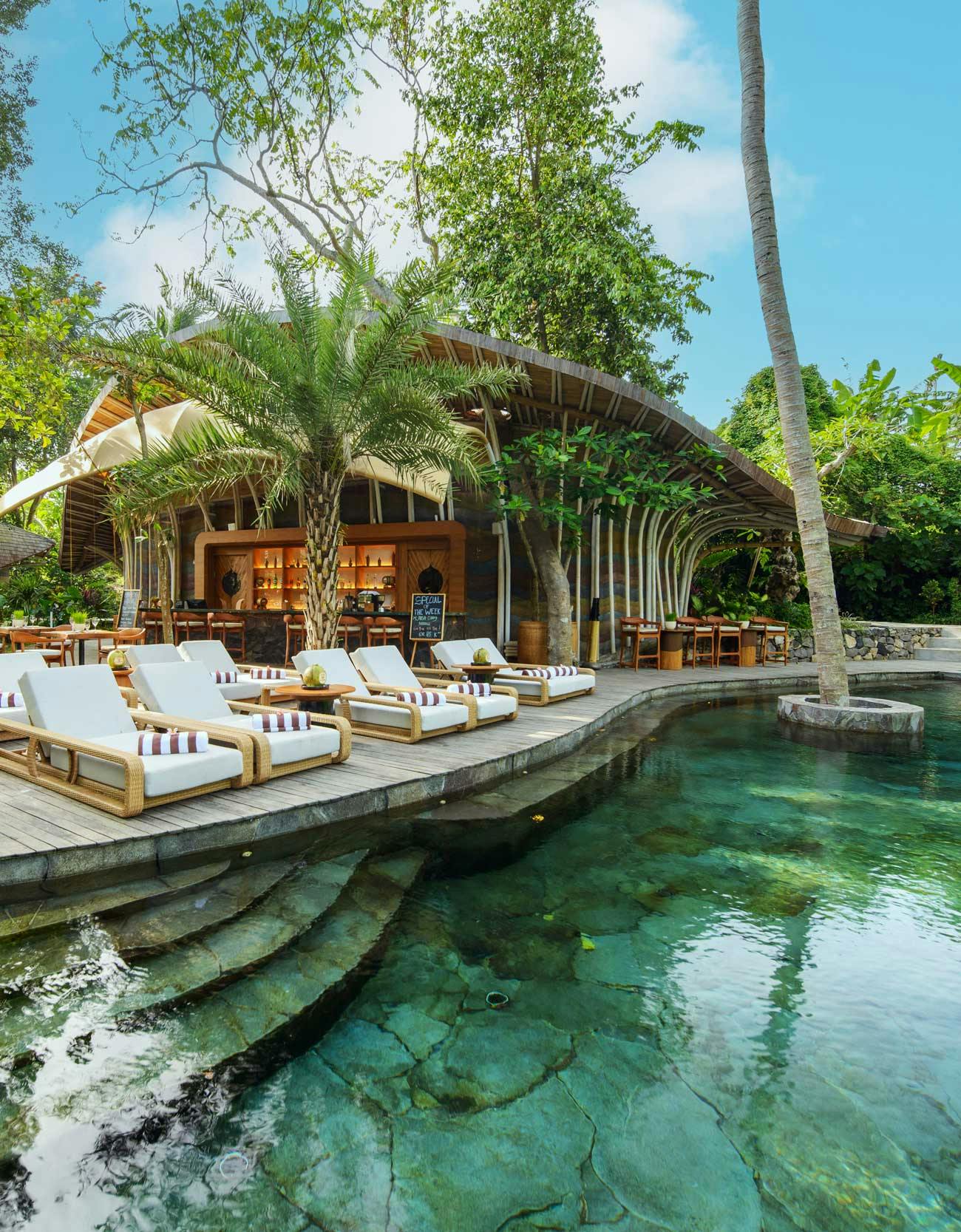 Long chairs by the pool