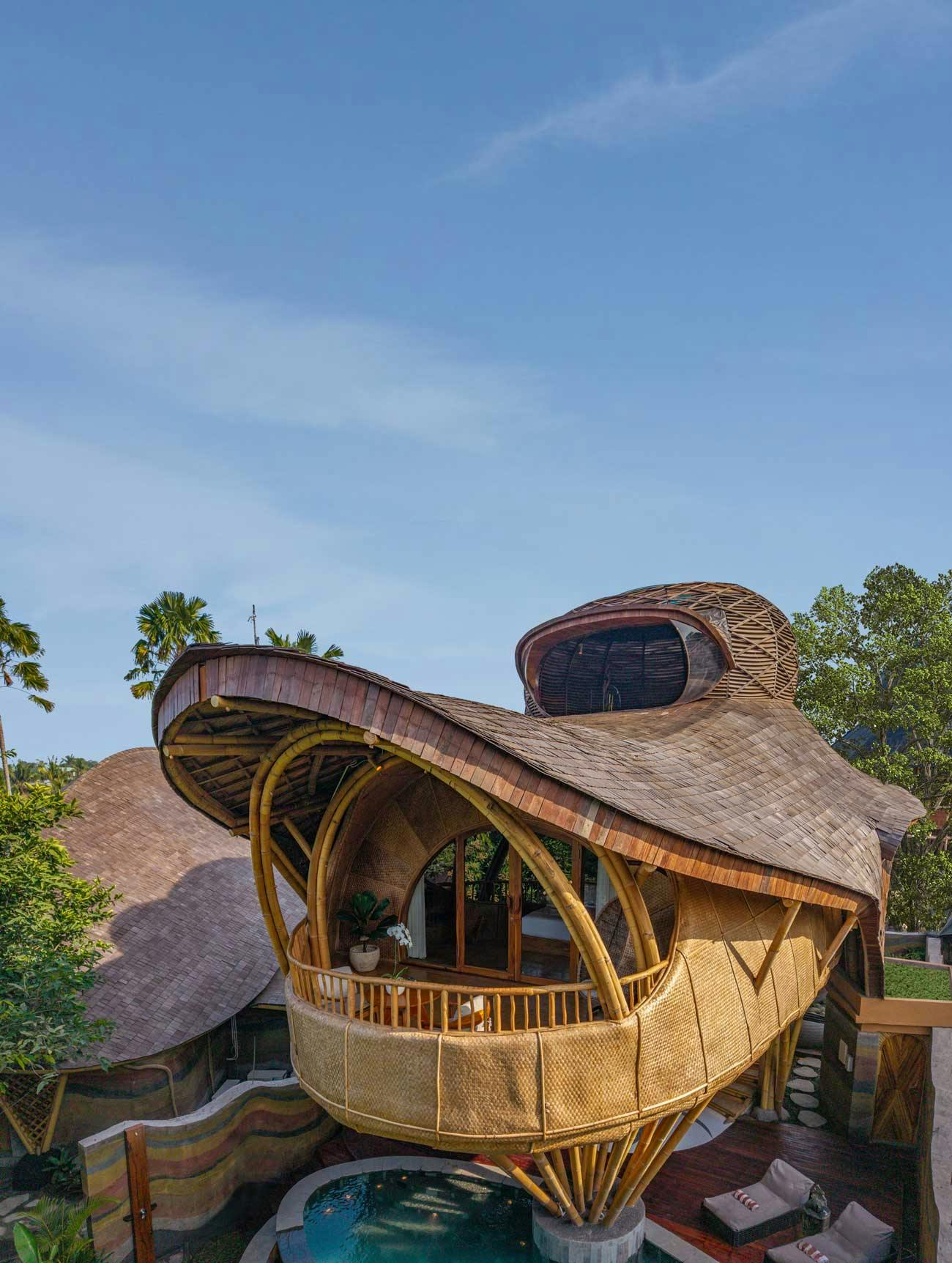 beautiful wooden villa drone view, surrounded by nature