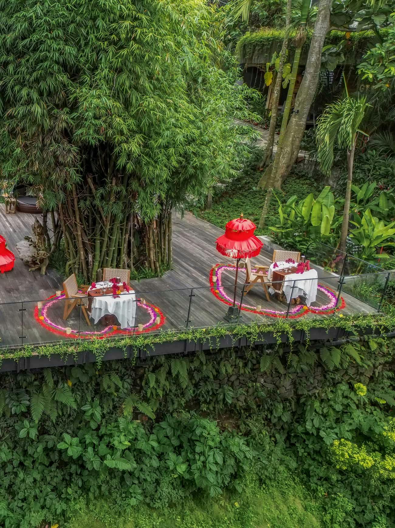 Romantic bamboo deck dining at a luxury resort in Bali