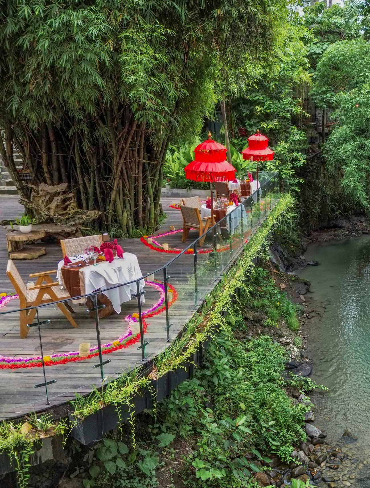 Romantic bamboo deck dining at a luxury resort in Bali