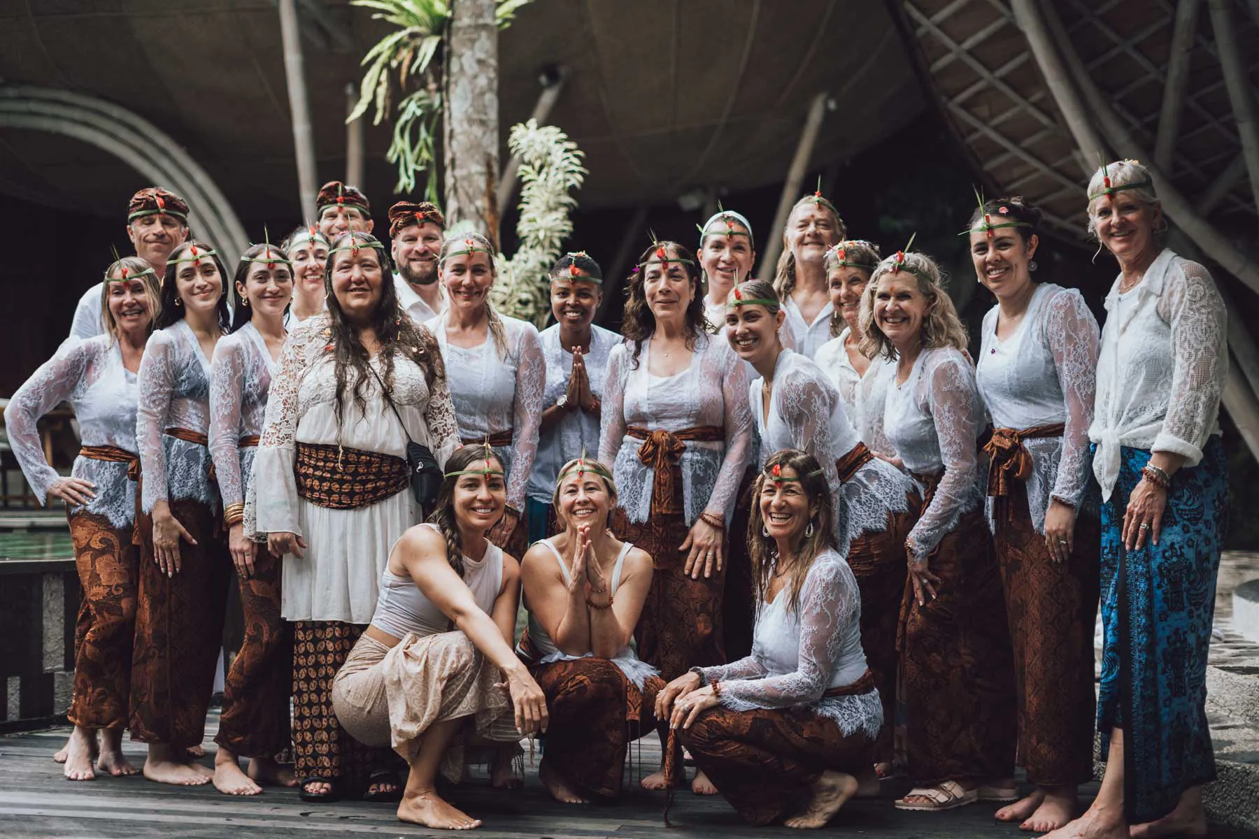 A group of women smiling at the camera after a wonderful retreat in a beautiful eco luxuy resort in bali