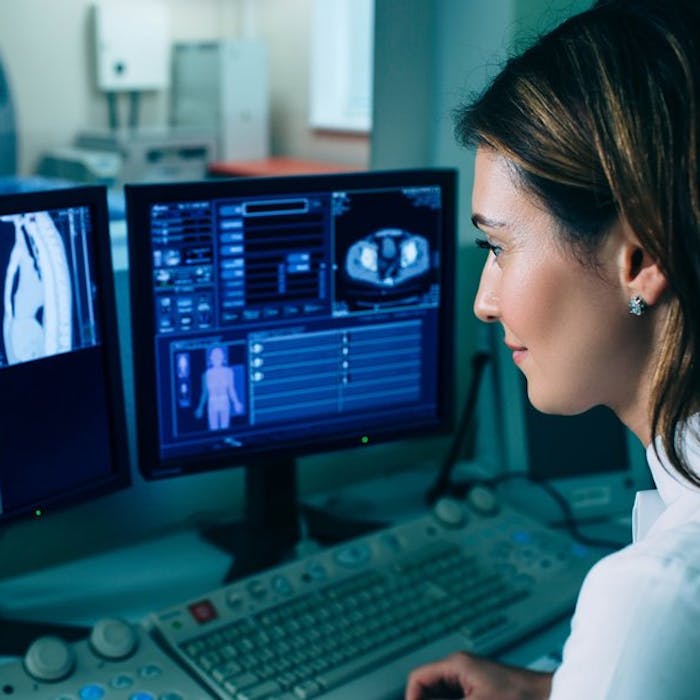 Doctor looking at display