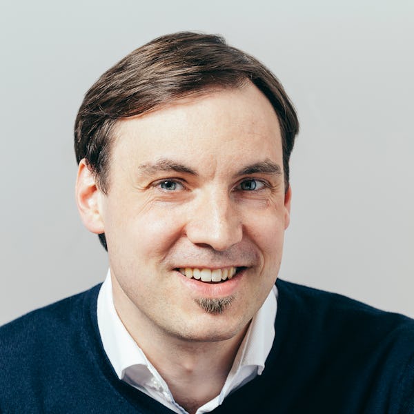 Headshot of Dr. Benjamin Trendelkamp-Schroer, Senior Machine Learning Engineer at Ultramarin.