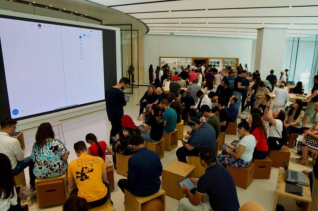 Audience at the Apple Dubai store learning about uMake