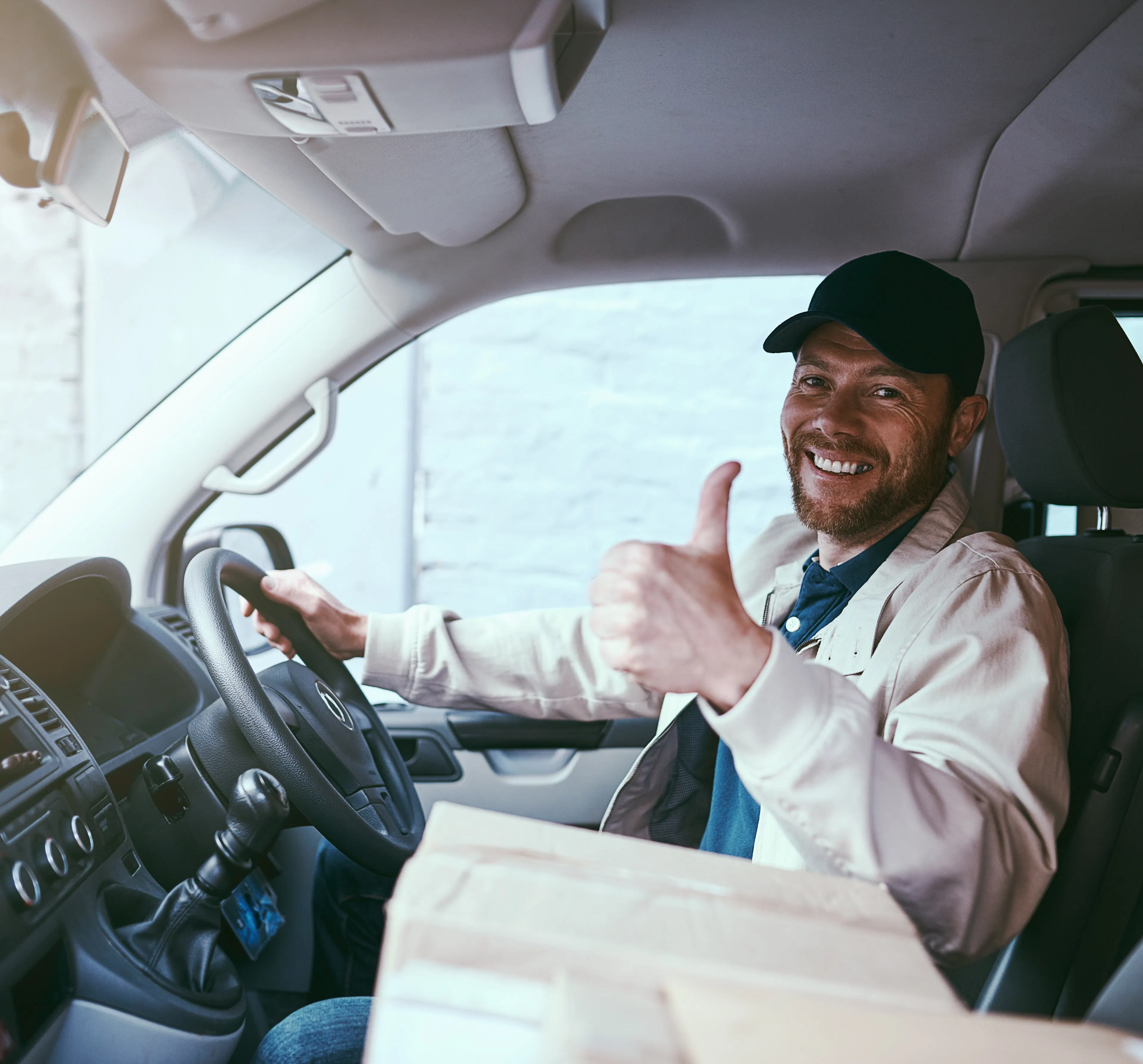 Delivery man, thumbs up and boxes in van with portrait, stock or happy for product, supply chain or shipping