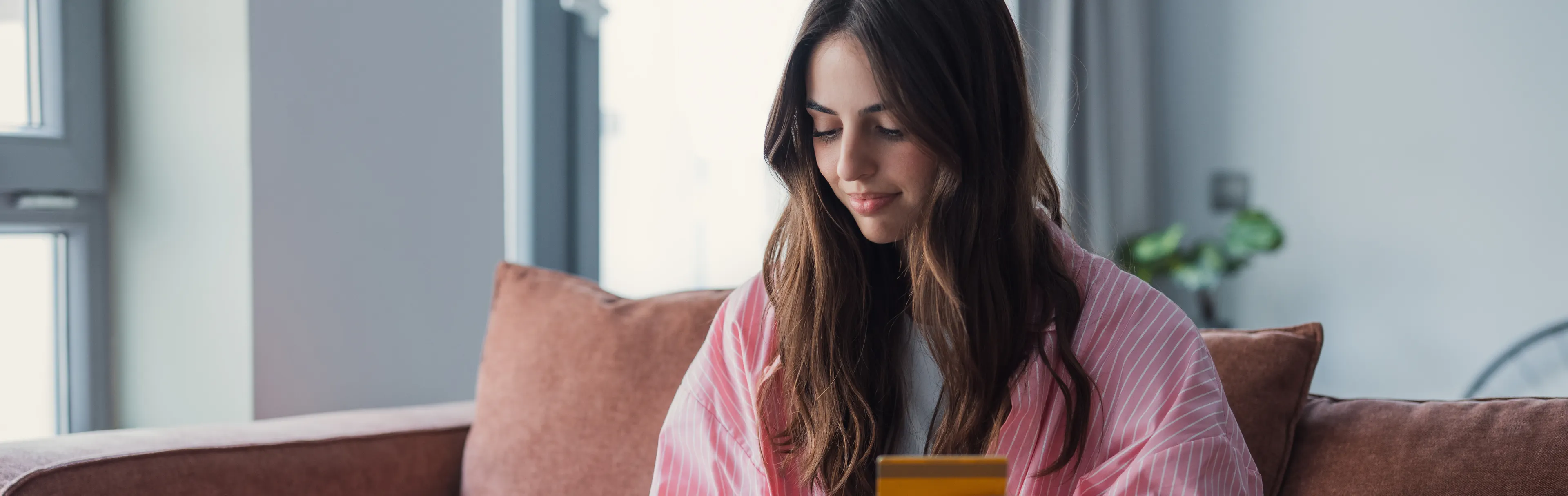 Young woman shopping securely online