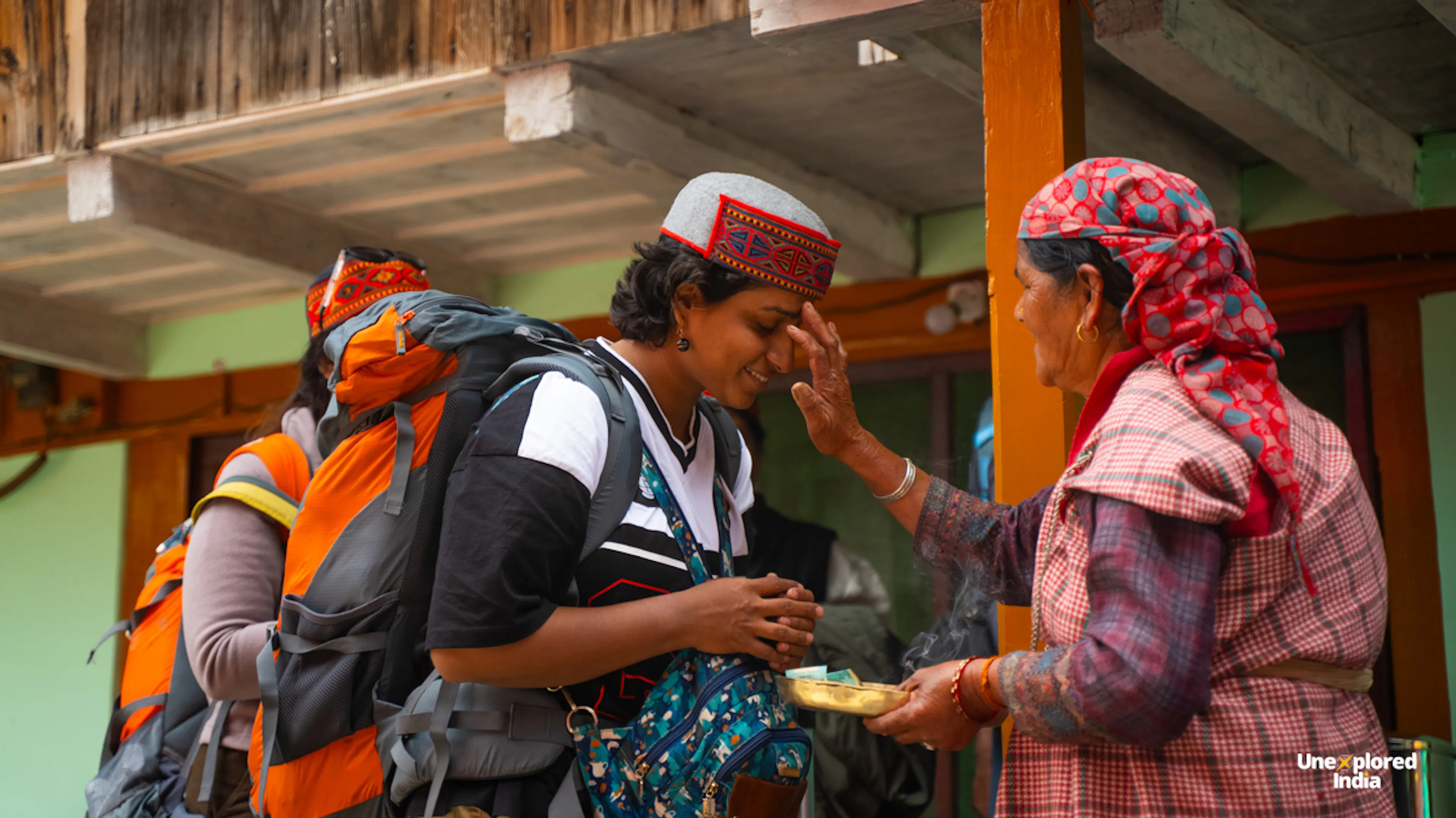 Villagers of Bhalyani welcoming guests with a traditional cap, Himachal Pradesh village culture