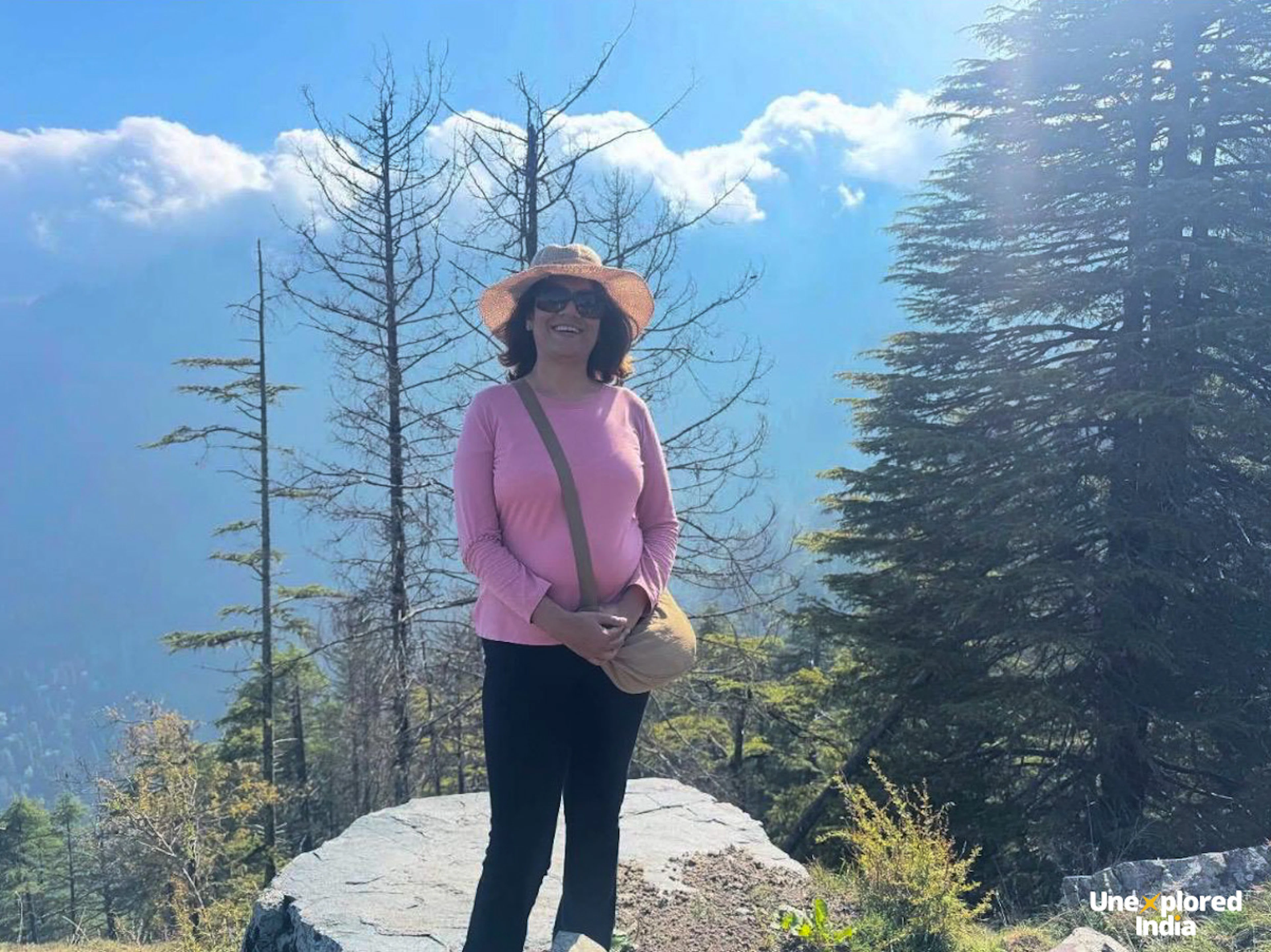 Traveler posing in a hill station backdrop